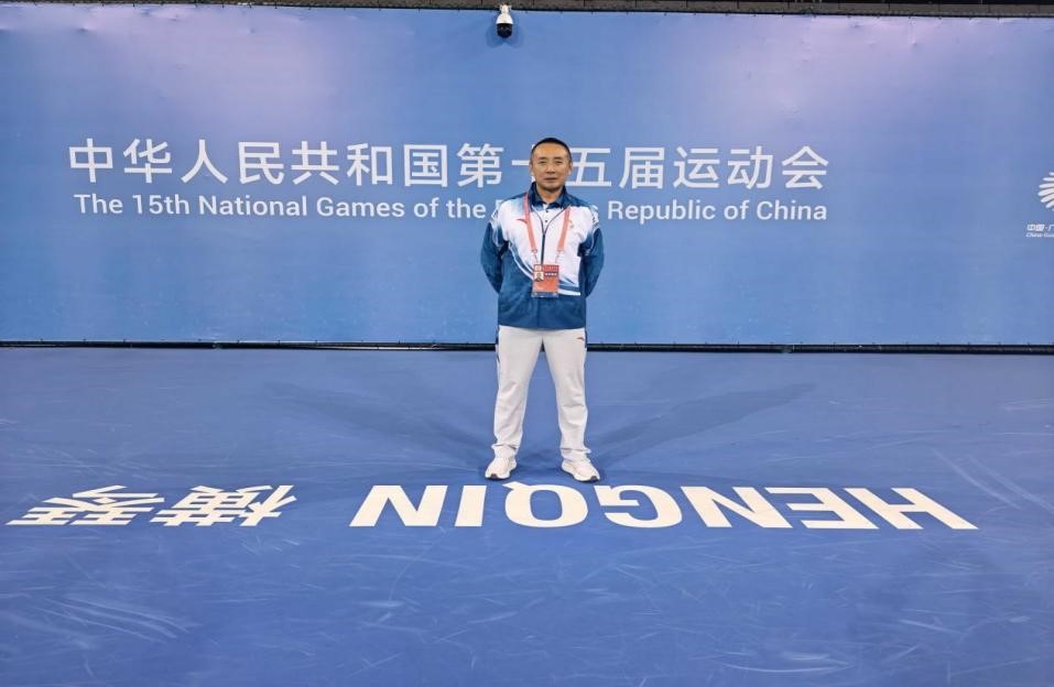 我校教师果召全、迟桂军圆满完成全国第十五届运动会执裁任务